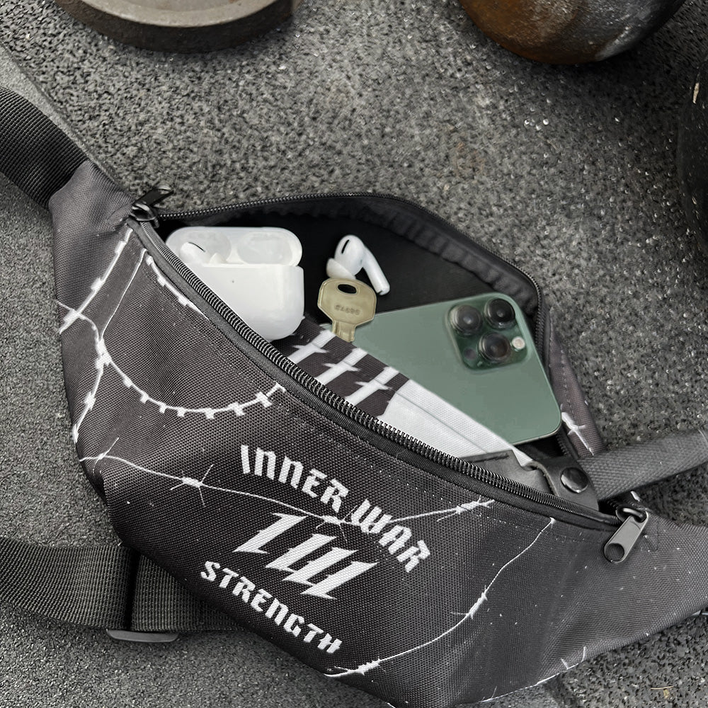 Barbed Black Fanny Pack, open with gym gear inside